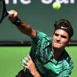 Federer in action in the final against compatriot Stan Wawrinka