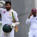 Azhar Ali does the salute after making his 14th Test century against West Indies